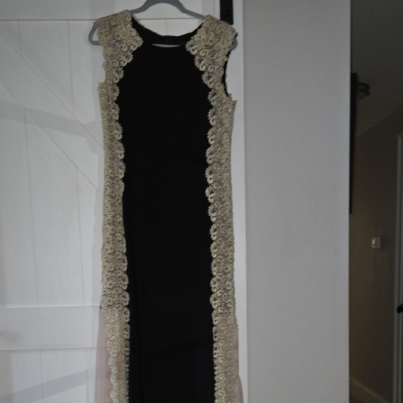 Xscape Dresses & Skirts - Elegant Black and Gold Lace Dress By XSCAPE SLINKY FABRIC